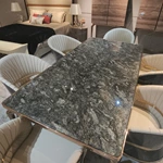 Rose Gold Metal Dining Table with Dark Polished Stone Top and Sculptural Cabriole Legs